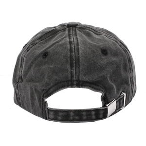 Detail of adjustable metal buckle and washed denim texture on charcoal baseball cap