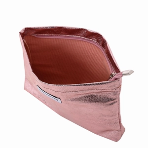 Top view of pink metallic PU leather makeup bag with interior lining and zipper detail
