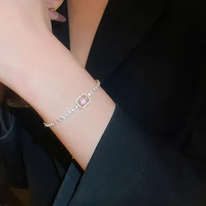 Elegant 18K rose gold bracelet with emerald-cut pink zircon and pavé diamond setting