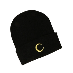 Classic black knit beanie with yellow crescent moon embroidery for winter warmth