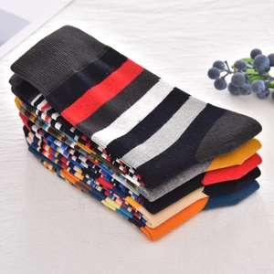 Classic colorful striped cotton crew socks for men with geometric patterns in various colors