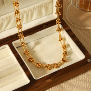 Minimalist 18K gold plated stainless steel knotted chain necklace in a luxury jewelry box
