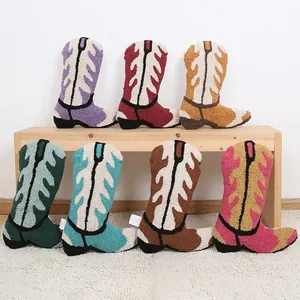 Set of seven tufted cowboy boot cushions in various vibrant colors for home decor