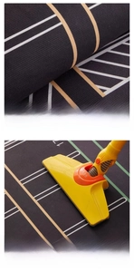 Close-up of geometric short-pile car mat showing durable fabric and vacuum cleaning