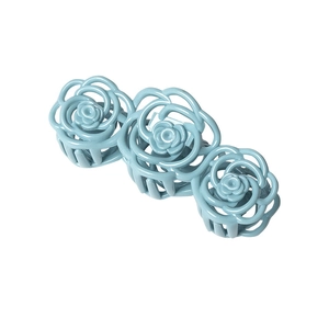 Elegant light blue matte hair claw clip featuring three hollow rose flowers for women