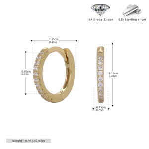Detail view of gold S925 sterling silver hoop earrings with 5A cubic zirconia stones