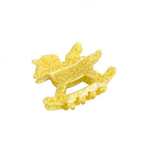 Elegant translucent yellow acetate shark hair claw clip in stylized rocking horse shape