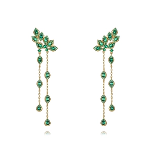 Luxurious gold drop earrings with green zircons and elegant tassel chains on white background