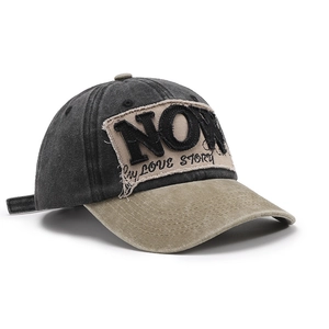 Vintage washed baseball cap with NOW embroidery and two-tone color blocking design