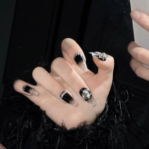 Dark goth black ombre coffin press-on nails with silver 3D rhinestones and glitter