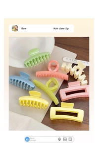 Vue détaillée de pinces à cheveux de style macaron aux couleurs pastel assorties