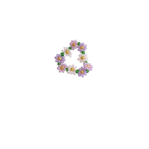 Handmade flower beaded necklace with purple and white floral patterns in a sweet garden style