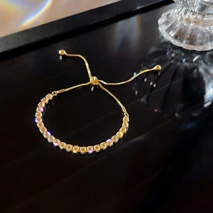 Sparkling gold adjustable bracelet with dense cubic zirconia and sliding clasp closure