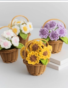 Detailed macro view of four mini crochet sunflower potted plants in brown woven baskets