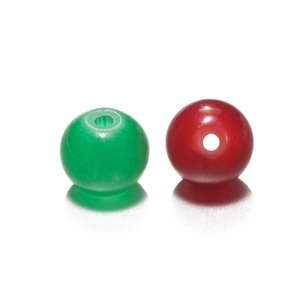 Macro detail of 8mm green and red polished glass beads with center holes for DIY crafts
