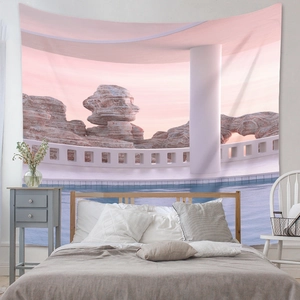 Detailed view of bohemian surreal landscape tapestry hanging in a modern bedroom interior