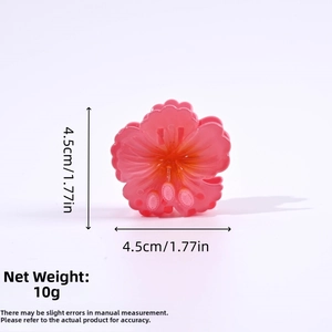 Detail view of pink 4.5cm hibiscus flower hair claw with exact size and weight measurements