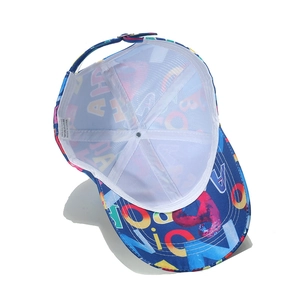 Detail of baseball cap interior showing white mesh lining and 100% polyester wash label
