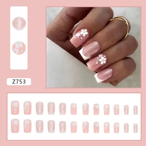 Pink French press-on nails with 3D white flowers, silver glitter, and pearl accents