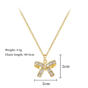 Golden butterfly necklace with zircon stones, showing 4.2g weight and 40+5cm chain length