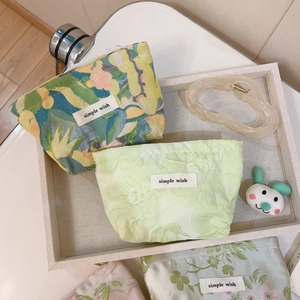 Green and yellow floral jacquard mini canvas storage bag with zip closure