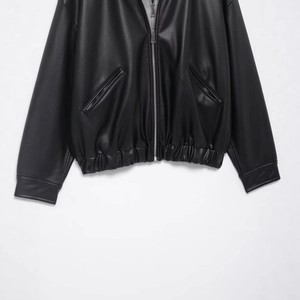 Women's black PU leather jacket featuring a zip closure and elastic hem detail