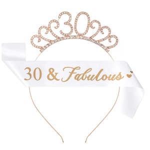 Close-up of 30 & Fabulous white satin sash and rose gold rhinestone tiara birthday set