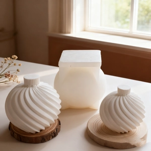 Detailed view of spiral texture on white spherical silicone mold for resin or candles