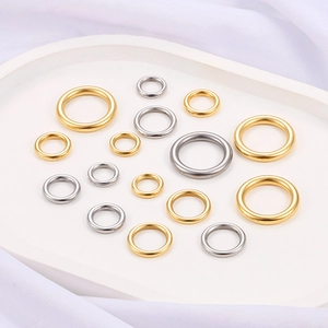 Golden and silver stainless steel jump rings in various sizes for DIY jewelry making