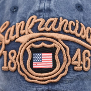 Macro shot of 3D embroidery on washed cotton baseball cap with American flag patch
