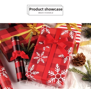 Christmas wrapping paper set with red snowflake, plaid and stripe designs for holiday gifts