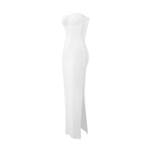Detail view of white strapless bodycon maxi dress featuring a high side slit detail