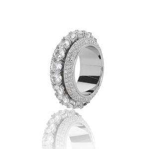 Macro view of silver spinning ring with five rows of pavé set white zircon stones