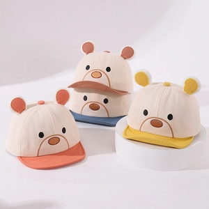 Detail of baby soft-brim baseball caps featuring 3D ears and cute cartoon bear embroidery