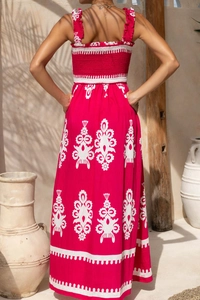Detail of bohemian print maxi dress with smocked back and ruffled straps for beach vacation