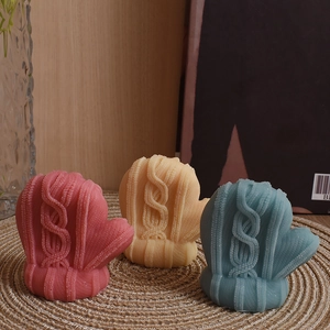 Knitted glove silicone mold for DIY winter candle making in pink, yellow and blue