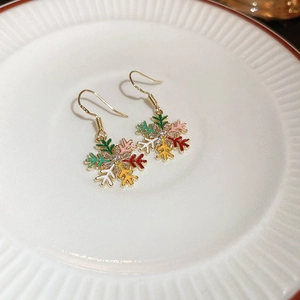 Colorful Christmas snowflake drop earrings with vibrant enamel and sparkling zircon centers