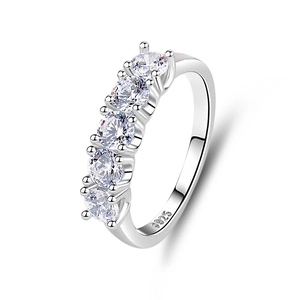 Minimalist S925 sterling silver ring featuring five sparkling round-cut moissanite stones