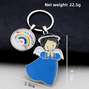 Detailed view of rainbow pendant and blue angel charm metal keychain with measurements