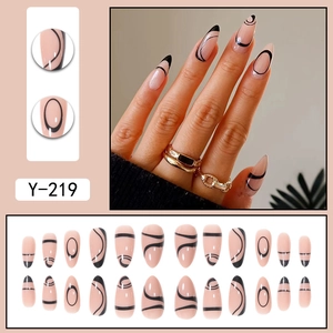 Almond French press-on nails with nude pink base and black abstract lines design Y-219