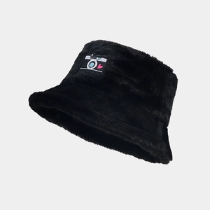 Close-up of black faux fur bucket hat with camera and heart embroidery detail