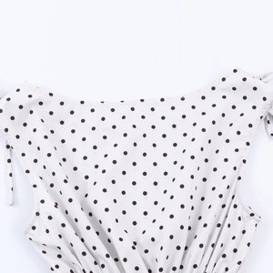 French vintage white sleeveless V-neck top with black polka dots and shirred waist