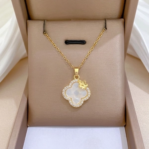 Titanium steel four-leaf clover necklace set with shell inlay and crystals in a gift box