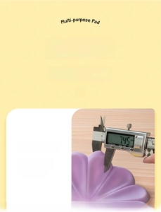 Detail showing 7.45mm thickness of the purple daisy silicone heat resistant coaster pad