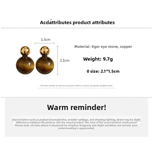 Detailed dimensions and 9.7g weight specifications of tiger eye stone heart earrings