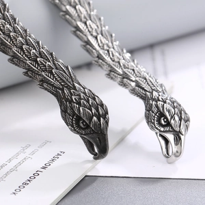 Punk eagle head stainless steel bracelet with vintage oxidized finish and fine feather texture