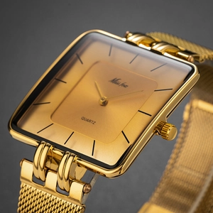 Detailed side view of a gold square quartz watch featuring a premium mesh metal strap