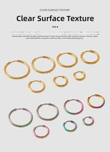 Detail of 2mm and 2.5mm wire diameter hoop earrings in gold and iridescent finish
