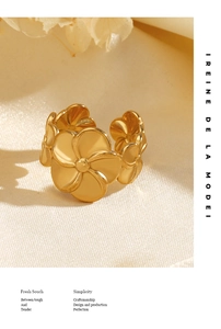 Detailed side view of a gold floral open ring with sculpted five-petal flower design
