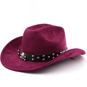Detail of dark purple faux suede cowboy hat with skull and rivet leather band
